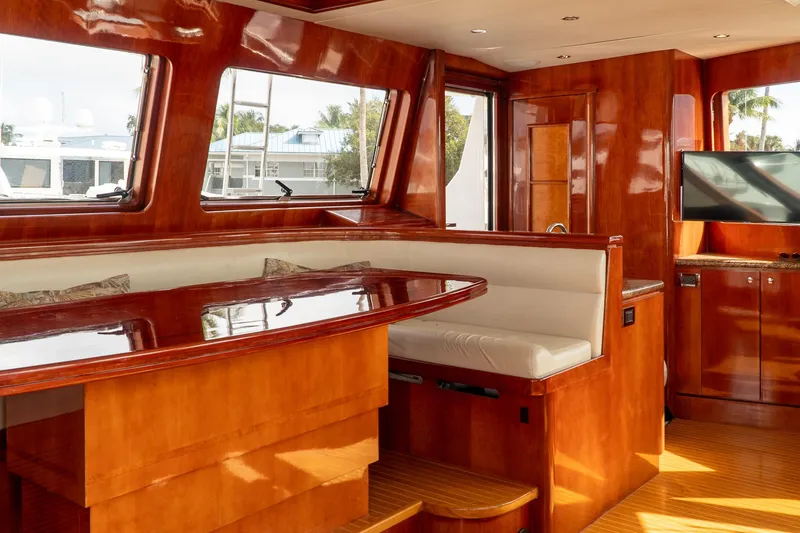 Slide: The Image of Luxurious interior of 2005 Ocean Alexander 80 Motoryacht with polished wood and plush seating. - 37