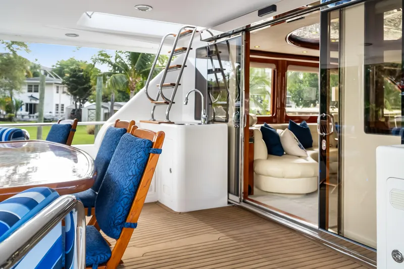 Slide: The Image of Luxurious 2005 Ocean Alexander 80 Motoryacht interior with elegant seating and dining area. - 5