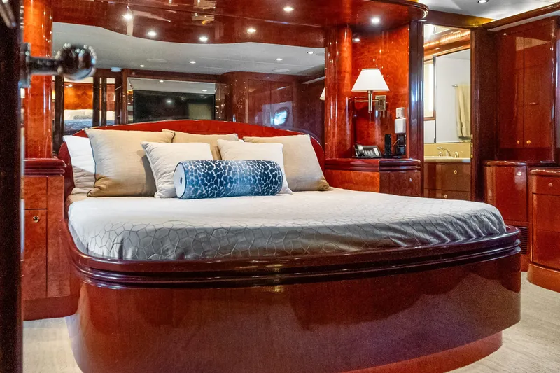 Slide: The Image of Luxurious bedroom interior of 2005 Ocean Alexander 80 Motoryacht with elegant wood finishes. - 53