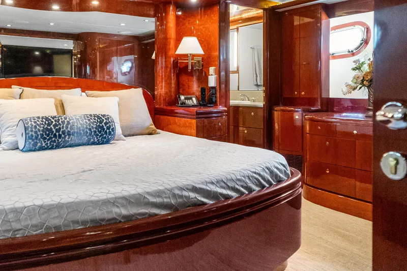 Slide: The Image of Luxurious bedroom interior of 2005 Ocean Alexander 80 Motoryacht with elegant wood finishes. - 60
