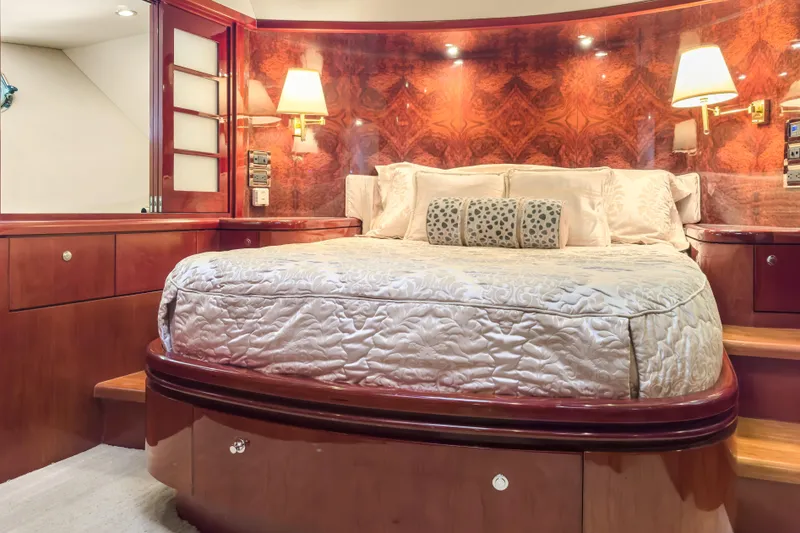 Slide: The Image of Luxurious bedroom interior of 2005 Ocean Alexander 80 Motoryacht with elegant wood finishes. - 62