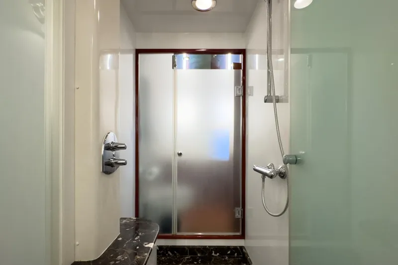 Slide: The Image of Luxurious bathroom in 2005 Ocean Alexander 80 Motoryacht with modern shower design. - 64