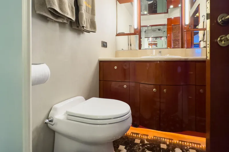 Slide: The Image of Luxurious bathroom in 2005 Ocean Alexander 80 Motoryacht with elegant wood cabinetry. - 65