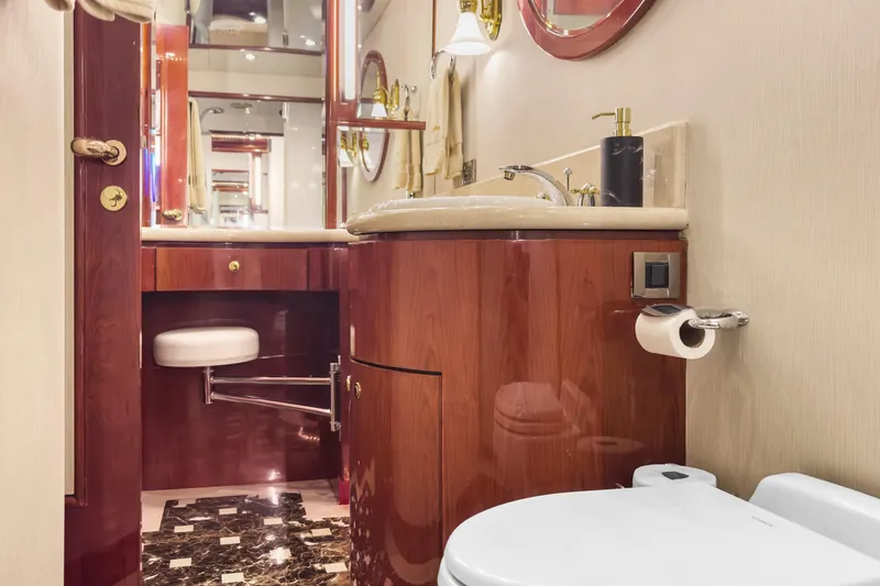 Slide: The Image of Luxurious bathroom in 2005 Ocean Alexander 80 Motoryacht with elegant wood cabinetry. - 66