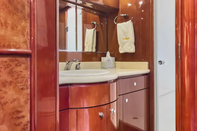 Slide: The Image of Luxurious bathroom interior of 2005 Ocean Alexander 80 Motoryacht with elegant wood finish. - 67