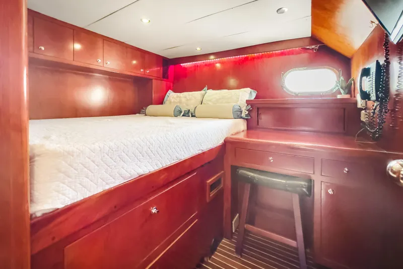 Slide: The Image of Luxurious cabin interior of 2005 Ocean Alexander 80 Motoryacht with wood finish and cozy bed. - 70