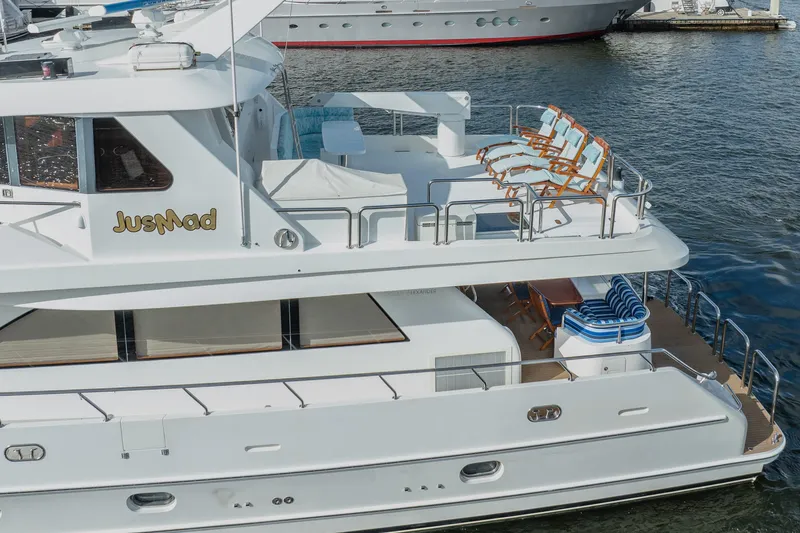 Slide: The Image of Luxury 2005 Ocean Alexander 80 Motoryacht with spacious deck and elegant seating. - 81