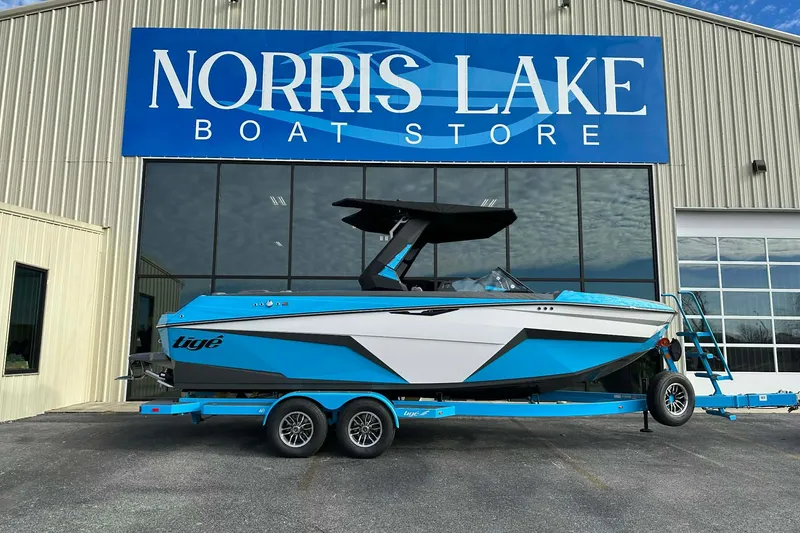 The Image of 2026 Tigé Z3 boat at Norris Lake Boat Store, vibrant blue and white design. - 0