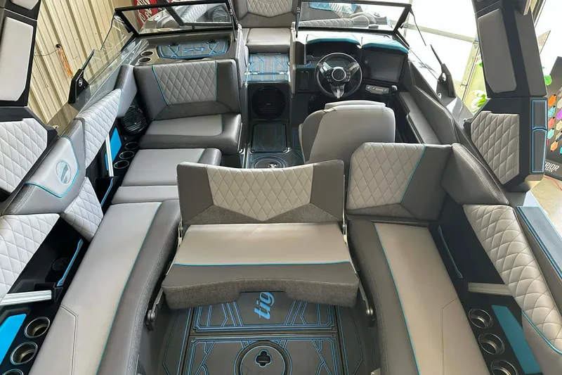 Slide: The Image of Luxurious interior of 2026 Tigé Z3 boat with modern seating and stylish design. - 12
