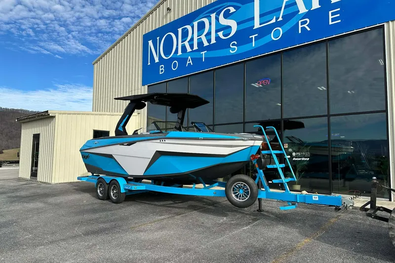 Slide: The Image of 2026 Tigé Z3 boat on trailer outside Norris Lake Boat Store. - 2