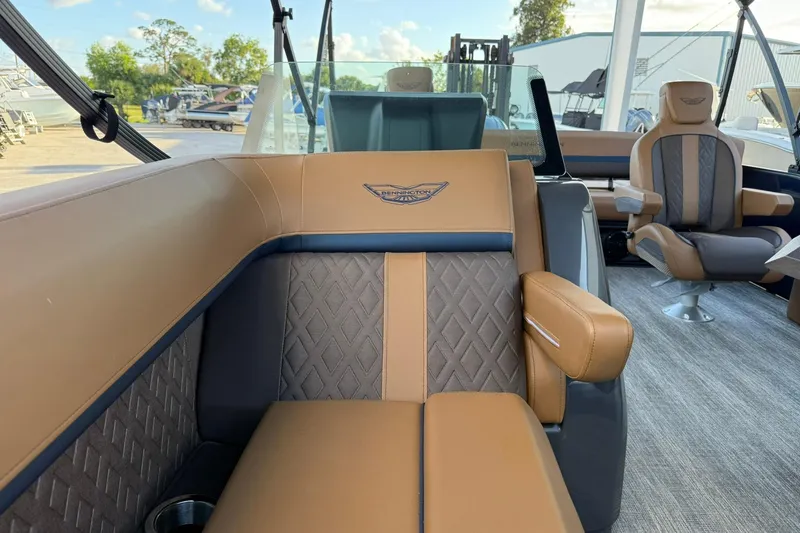 Slide: The Image of Luxurious interior of 2026 Bennington 22 M Swingback pontoon boat with plush seating. - 25