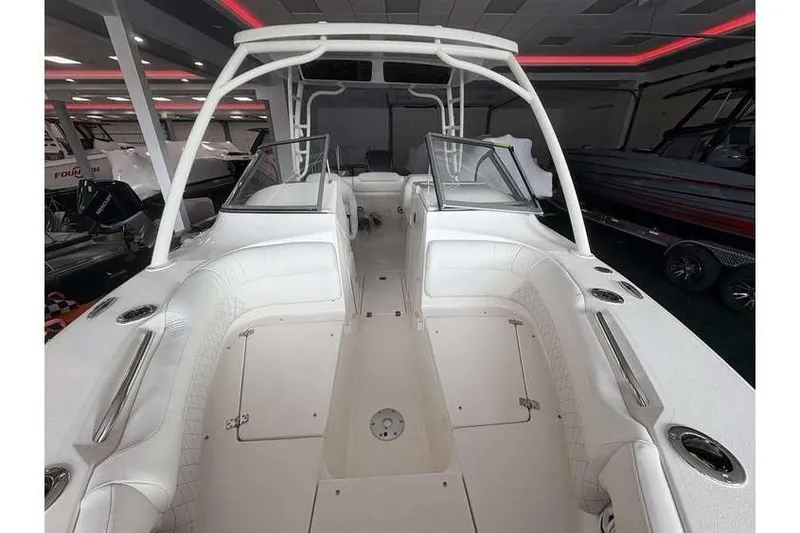 Slide: The Image of 2026 Key West 239 DFS boat interior with white seating and modern design. - 22