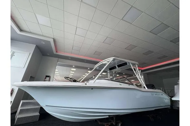 Slide: The Image of 2026 Key West 239 DFS boat displayed indoors with sleek design and modern features. - 3