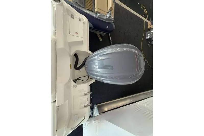 Slide: The Image of 2026 Key West 239 DFS boat with a sleek outboard motor. - 5