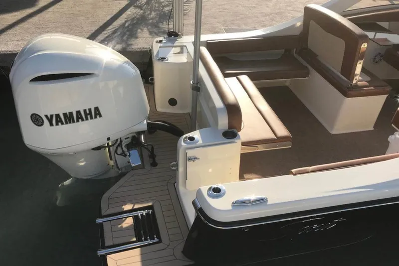 Slide: The Image of 2024 Scout 240 Dorado boat interior with seating and helm station. - 8