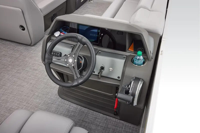 Slide: The Image of Manufacturer Provided Image: 2026 Sun Tracker Party Barge 20 DLX helm with steering wheel and control panel. - 18