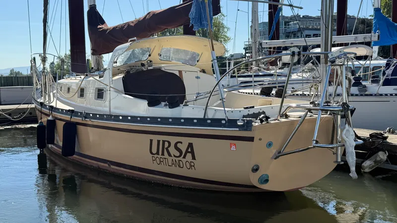 Slide: The Image of 1984 Cascade 36 sailboat named "URSA" docked in Portland, Oregon marina. - 28