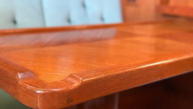 Slide: The Image of Polished wooden surface of a 1984 Cascade 36 interior, showcasing craftsmanship and design. - 5
