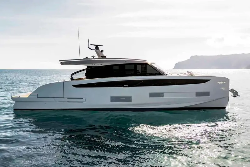 Slide: The Image of Manufacturer Provided Image: 2025 Azimut Seadeck 6 yacht on serene ocean waters, showcasing sleek design and luxury. - 1