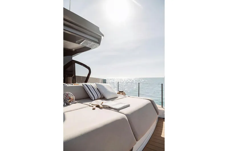Slide: The Image of Manufacturer Provided Image: Luxurious Azimut Seadeck 6 yacht deck with sunbed, ocean view, 2025 model. - 4