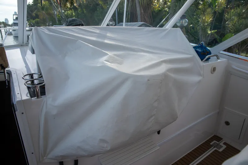 Slide: The Image of Covered helm area of a 2015 Albemarle 360 Express Fisherman boat. - 14