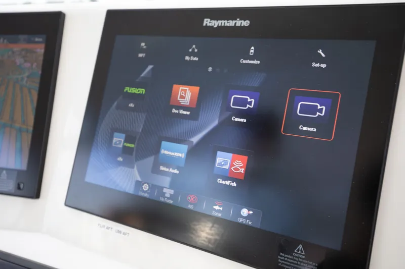 Slide: The Image of Raymarine display on 2015 Albemarle 360 Express Fisherman boat, showing camera and navigation options. - 21