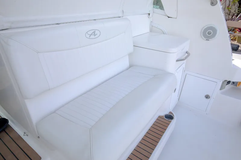 Slide: The Image of White seating area on 2015 Albemarle 360 Express Fisherman boat interior. - 28