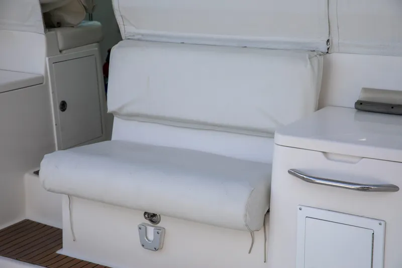 Slide: The Image of White seating area on 2015 Albemarle 360 Express Fisherman boat interior. - 29