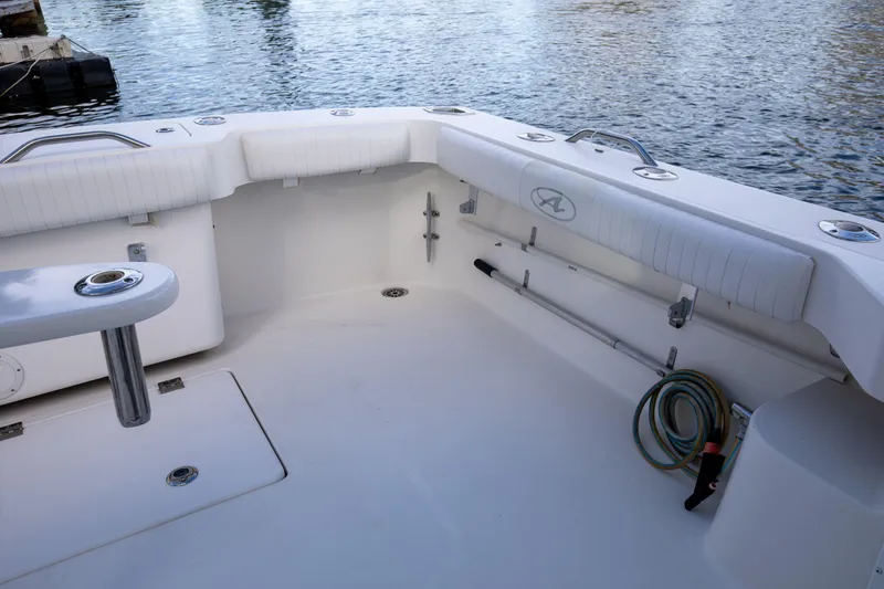 Slide: The Image of 2015 Albemarle 360 Express Fisherman boat deck with seating and fishing rod holders. - 40