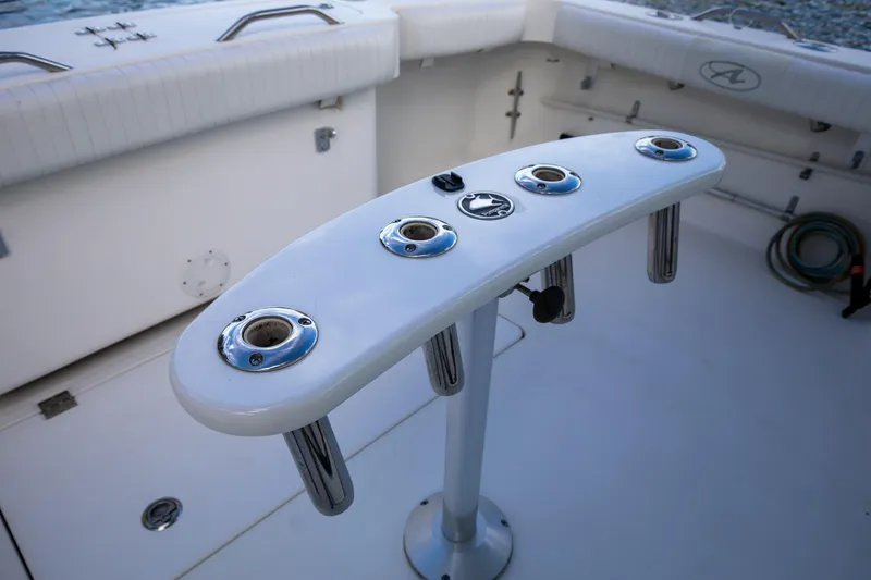 Slide: The Image of 2015 Albemarle 360 Express Fisherman cockpit with rod holders and storage. - 41
