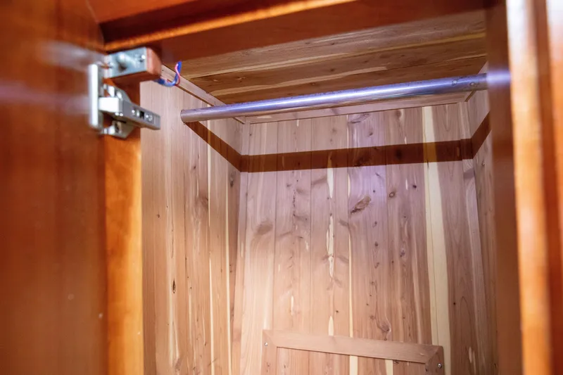 Slide: The Image of Wooden closet interior on 2015 Albemarle 360 Express Fisherman boat. - 59