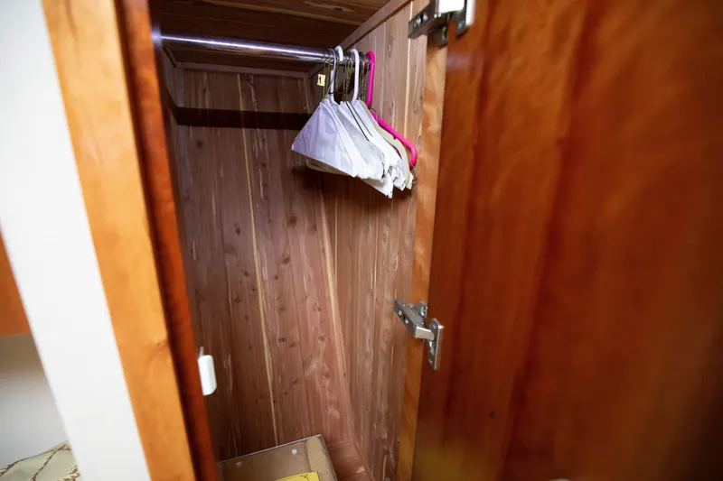 Slide: The Image of Wooden closet interior on 2015 Albemarle 360 Express Fisherman boat. - 60