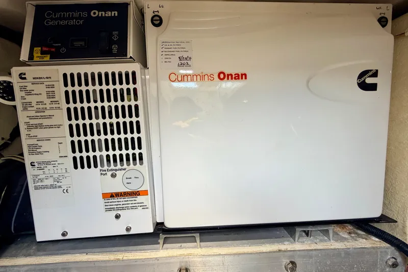 Slide: The Image of Cummins Onan generator in 2015 Albemarle 360 Express Fisherman boat. - 70