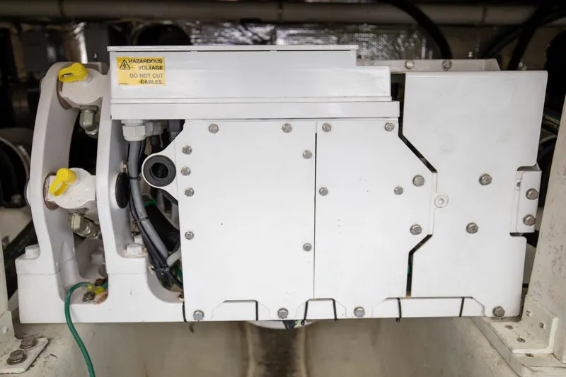 Slide: The Image of Engine compartment of 2015 Albemarle 360 Express Fisherman with electrical components and warning label. - 72