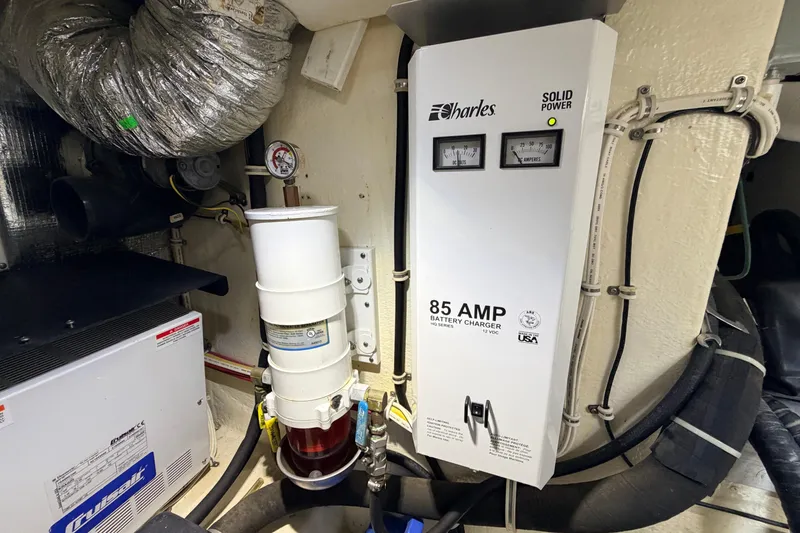 Slide: The Image of Engine room of 2015 Albemarle 360 Express Fisherman with battery charger and ventilation system. - 73