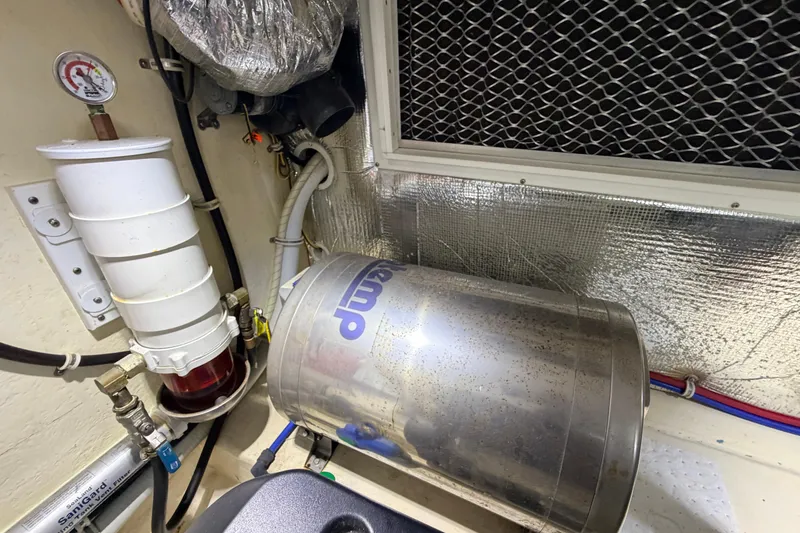 Slide: The Image of Engine room of 2015 Albemarle 360 Express Fisherman with fuel filter and metal tank. - 74