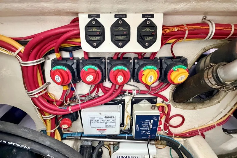 Slide: The Image of Electrical panel with switches and wiring on a 2015 Albemarle 360 Express Fisherman boat. - 76
