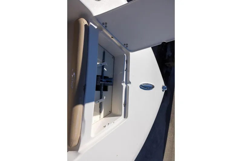 Slide: The Image of 2020 Scout 195 Sportfish boat interior with open storage compartment. - 9