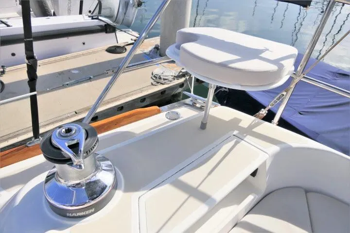 Slide: The Image of Cockpit of 2002 Tartan 3700 sailboat with winch and seating. - 51