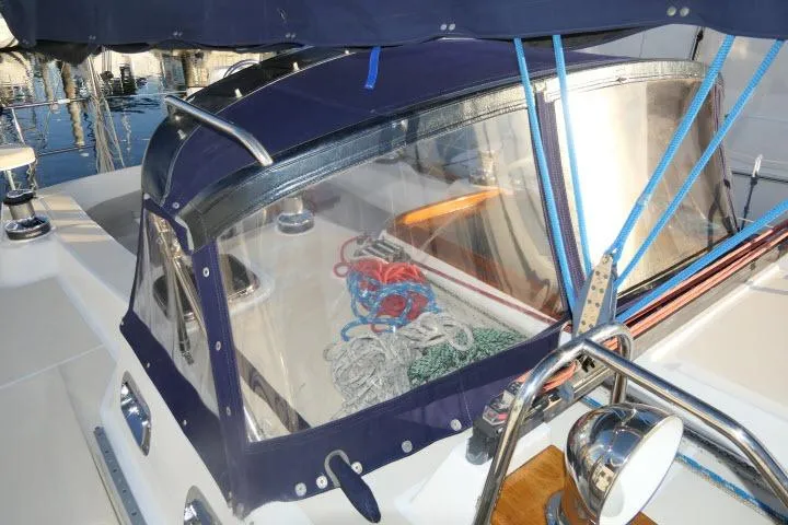 Slide: The Image of Tartan 3700 sailboat cockpit with ropes and blue canopy, 2002 model. - 65