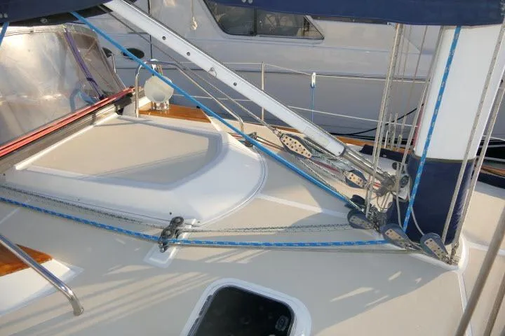 Slide: The Image of 2002 Tartan 3700 sailboat deck with rigging and hatch. - 67