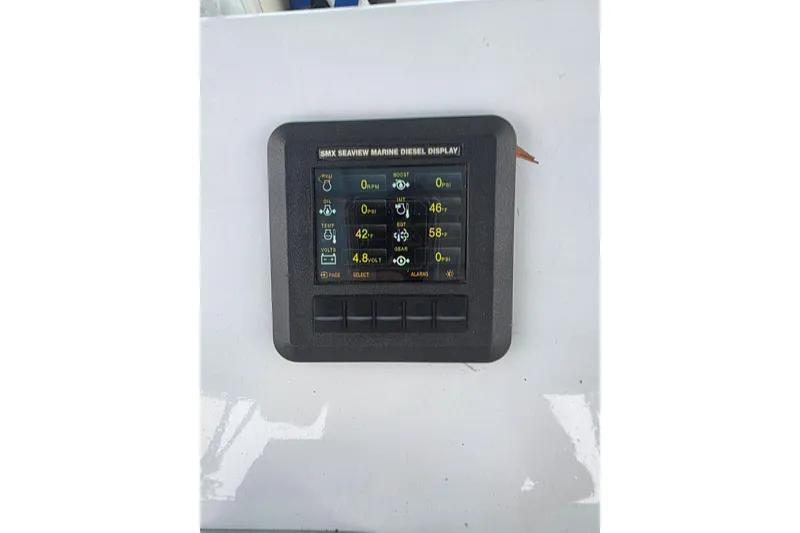 Slide: The Image of SMX Seaview marine diesel display on 1987 Hatteras 52 Convertible yacht. - 56