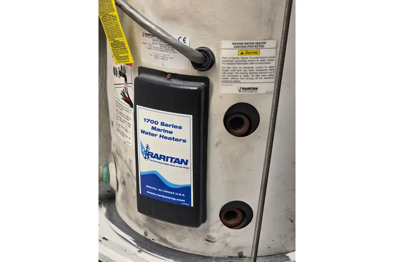 Slide: The Image of Raritan 1700 Series Marine Water Heater on 1987 Hatteras 52 Convertible. - 71