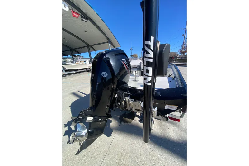 Slide: The Image of 2019 Crestliner 1800 Bay boat with Talon anchor system and outboard motor. - 22