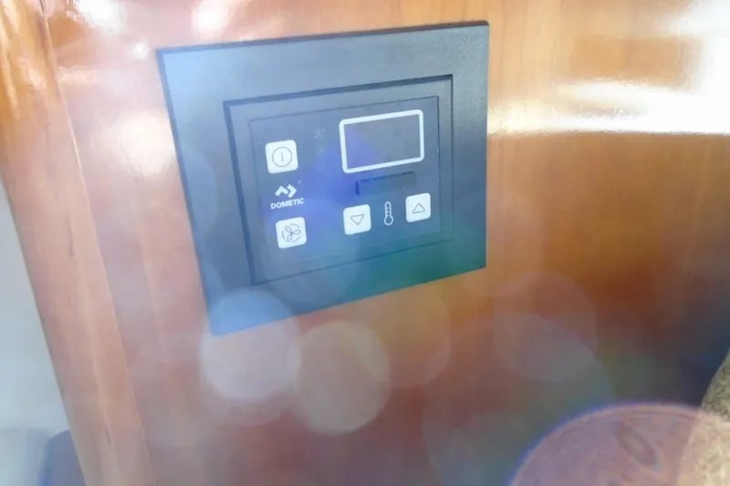 Slide: The Image of Control panel on 2004 Carver 356 Motor Yacht, featuring Dometic system. - 31