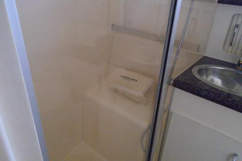 Slide: The Image of Shower area in 2004 Carver 356 Motor Yacht with glass door and sink. - 46