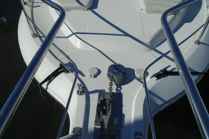 Slide: The Image of Bow of 2004 Carver 356 Motor Yacht with anchor and railings. - 61