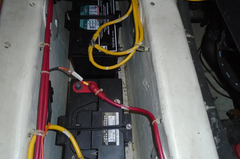 Slide: The Image of Battery compartment of 2004 Carver 356 Motor Yacht with visible wiring. - 65