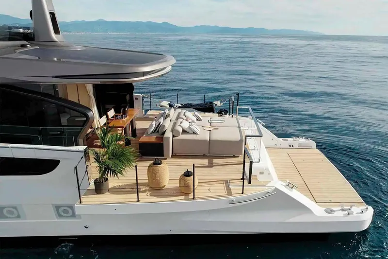 Slide: The Image of Manufacturer Provided Image: Luxurious 2025 Azimut Seadeck 7 yacht with elegant deck and ocean view. - 2