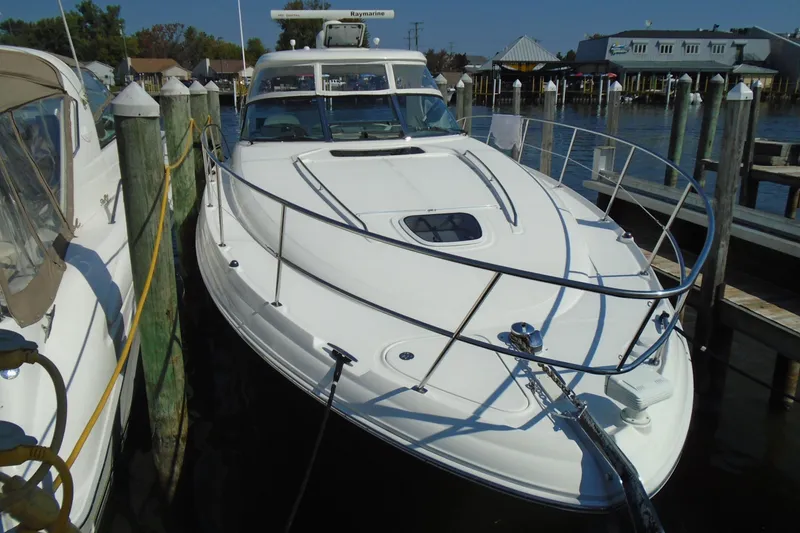 Slide: The Image of 2007 Sea Ray 40 Sundancer yacht docked at marina, front view. - 1
